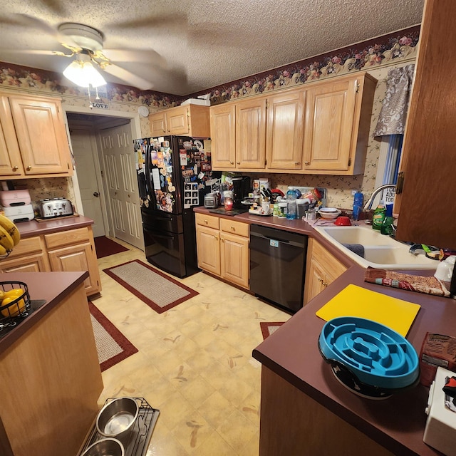 kitchen featuring light brown cabinets, black appliances, sink, ceiling fan, and a textured ceiling