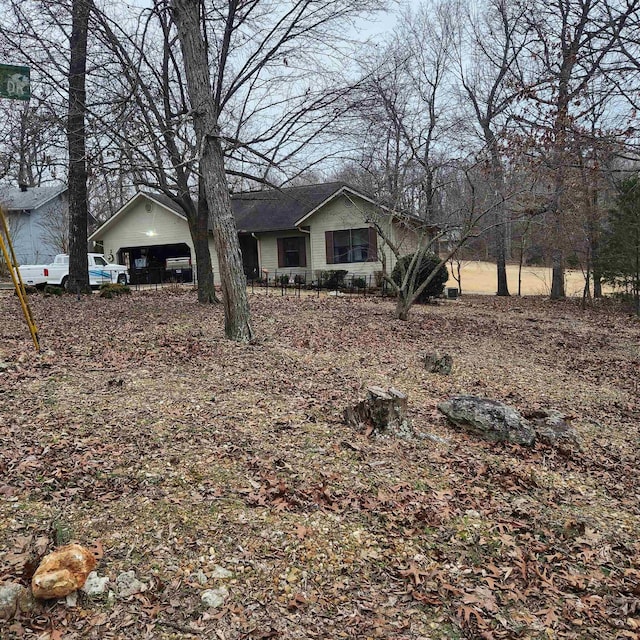 view of front of property featuring a garage