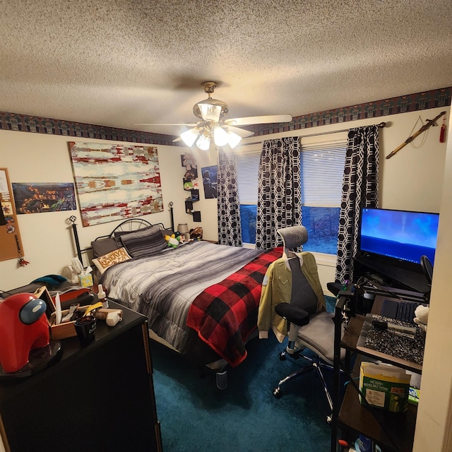 bedroom with carpet, ceiling fan, and a textured ceiling