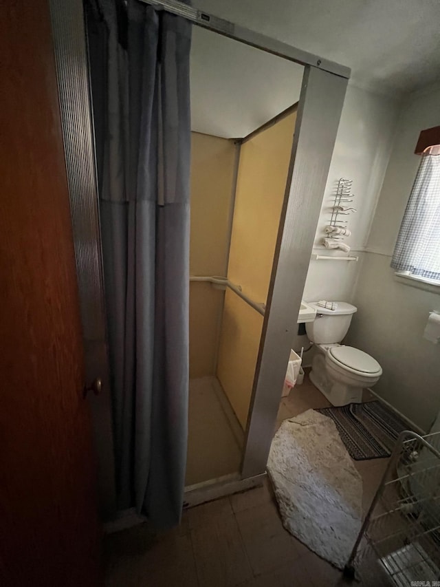 bathroom featuring toilet