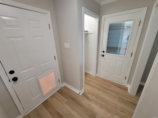 doorway with light hardwood / wood-style floors