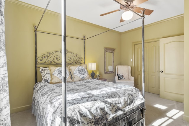 bedroom featuring carpet, ceiling fan, and ornamental molding