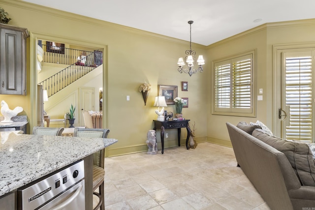 interior space featuring a notable chandelier and ornamental molding