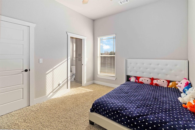 bedroom featuring light carpet and ceiling fan