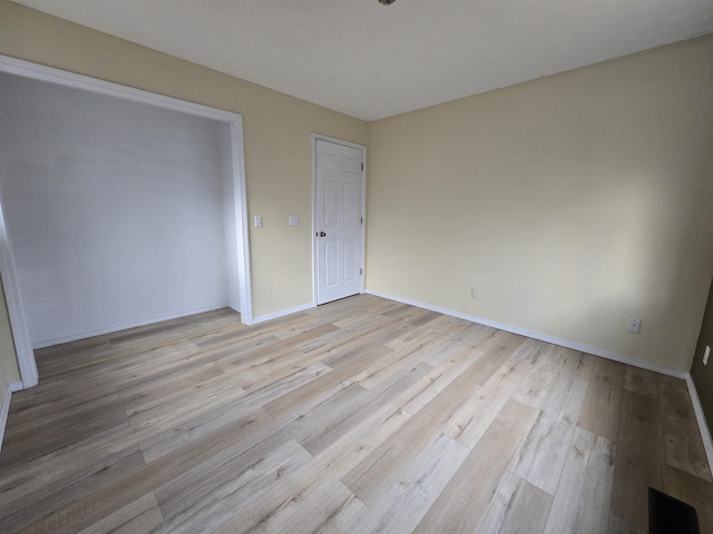 unfurnished bedroom featuring light hardwood / wood-style flooring