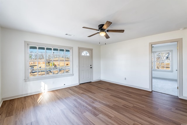 entryway with ceiling fan and hardwood / wood-style floors