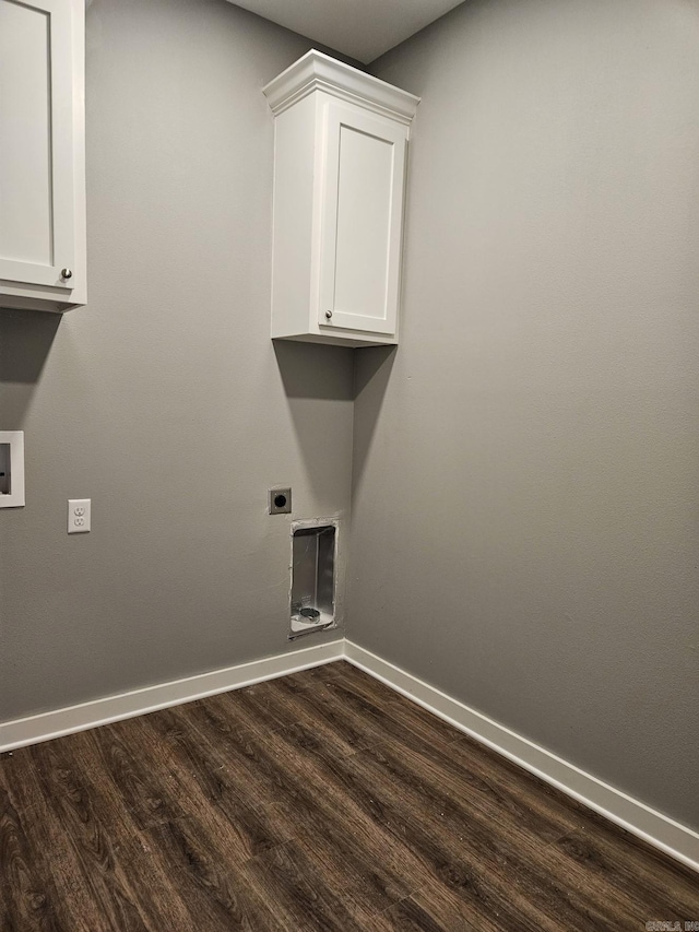 washroom with dark hardwood / wood-style flooring, hookup for a washing machine, cabinets, and hookup for an electric dryer