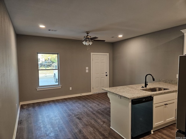 kitchen featuring dishwasher, dark wood-type flooring, sink, light stone counters, and white cabinetry