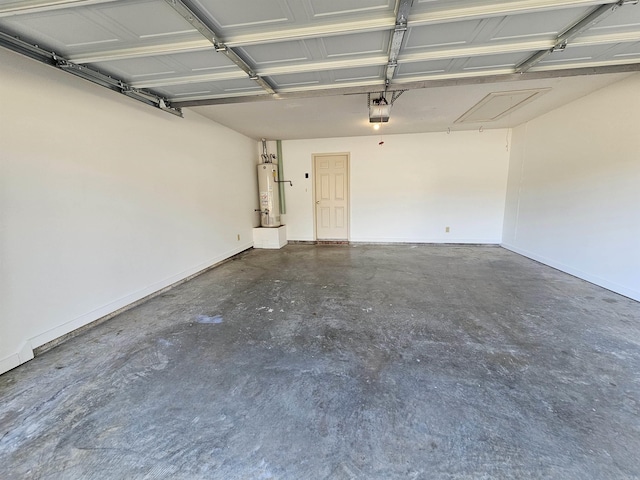 garage featuring water heater and a garage door opener