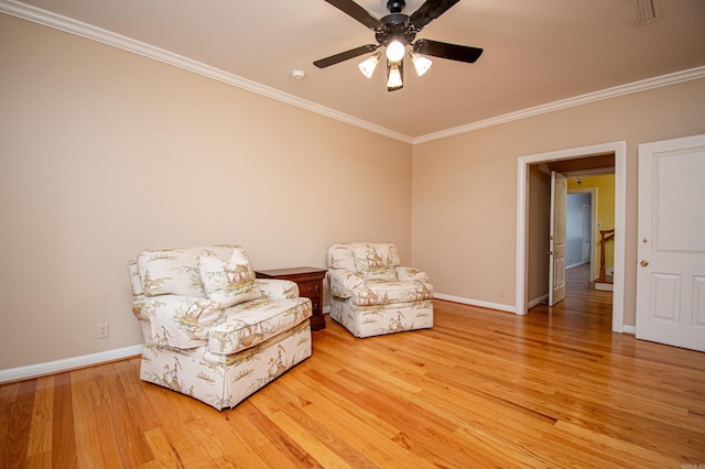 unfurnished room with ceiling fan, wood-type flooring, and ornamental molding