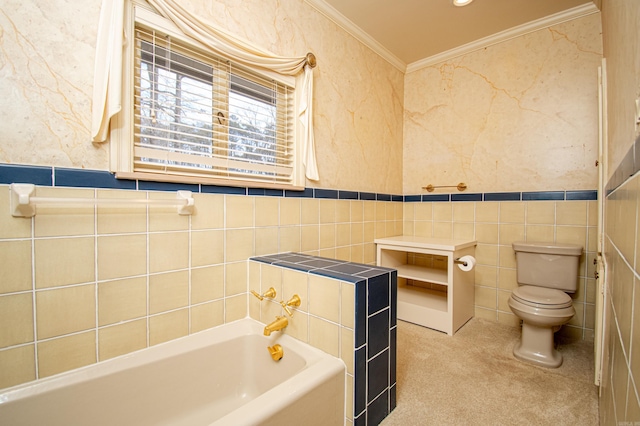 bathroom featuring a tub to relax in, toilet, tile walls, and crown molding