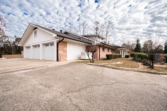 view of home's exterior with a garage