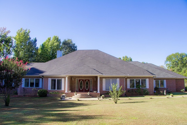 ranch-style house with a front yard