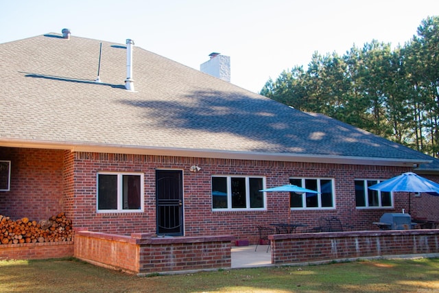 back of house featuring a patio