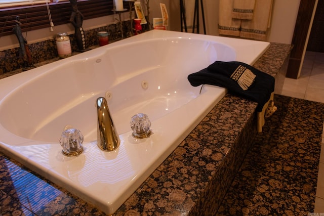 room details with a relaxing tiled tub