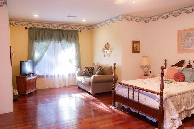 bedroom featuring dark wood-type flooring