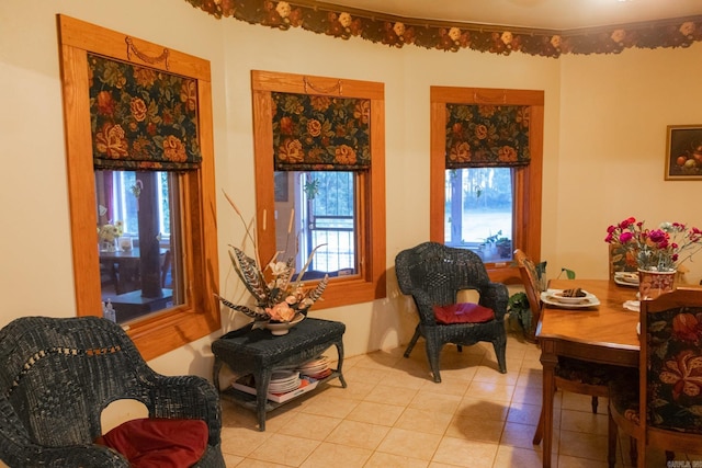 sitting room with light tile patterned floors