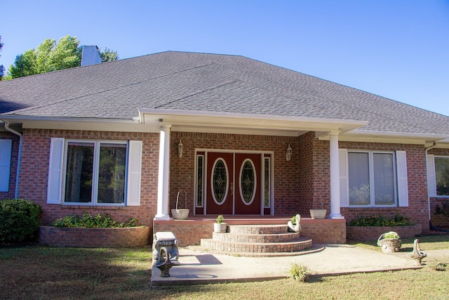 ranch-style home with a porch