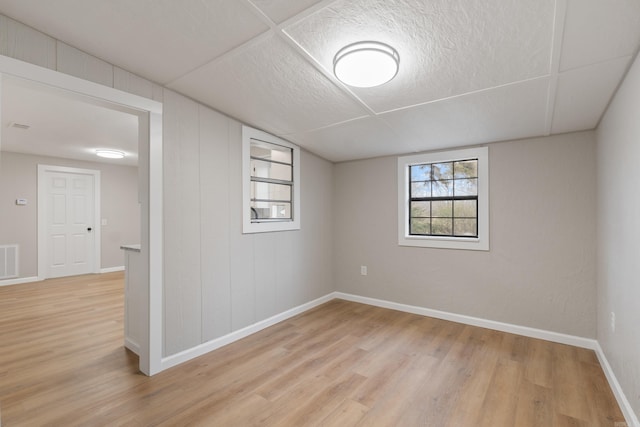 spare room featuring light wood-type flooring