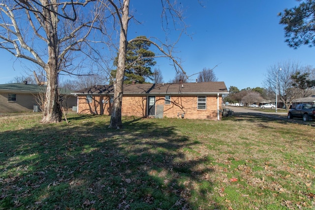 exterior space with a yard