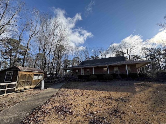 view of property exterior featuring an outbuilding