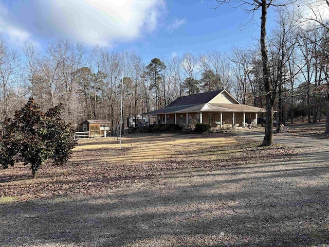 view of home's exterior featuring an outbuilding