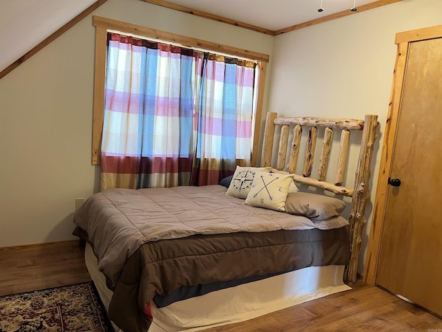 bedroom featuring wood-type flooring