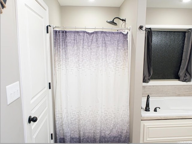 bathroom featuring a tub