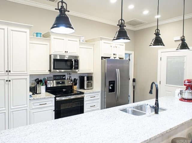 kitchen with appliances with stainless steel finishes, pendant lighting, sink, ornamental molding, and light stone countertops