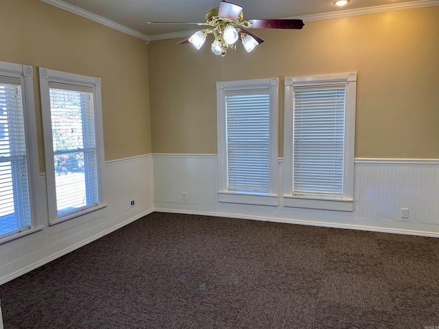 unfurnished room with carpet floors, ceiling fan, and crown molding