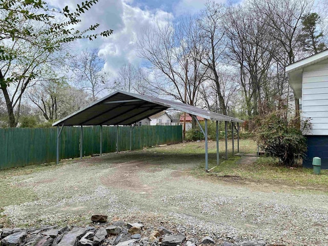 view of vehicle parking featuring a carport