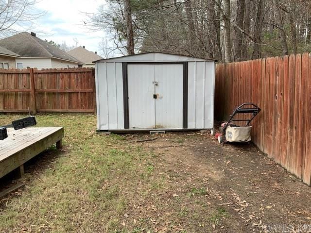 view of outdoor structure with a lawn