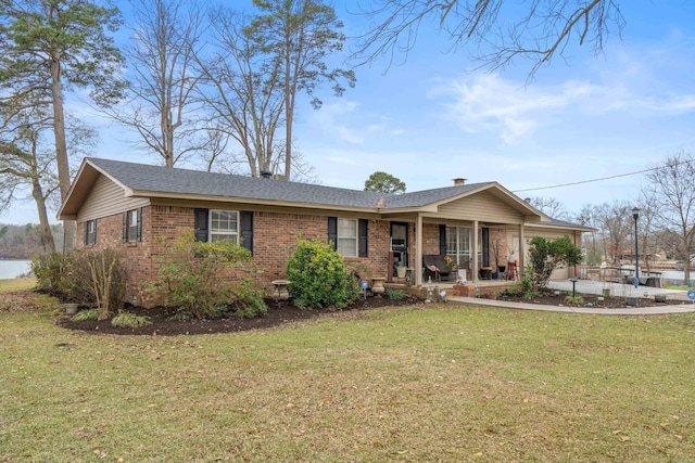 ranch-style house with a front lawn