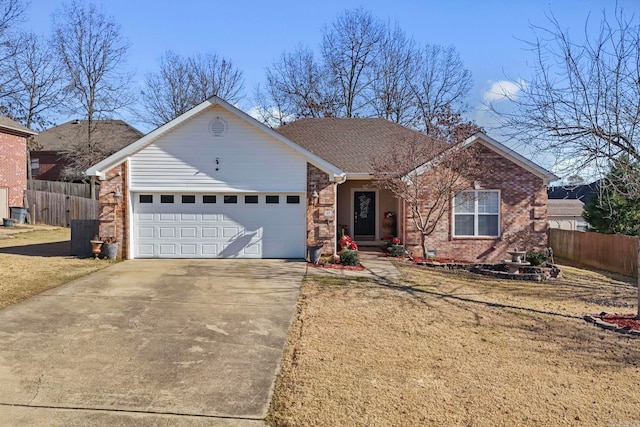 ranch-style house featuring a front lawn and a garage