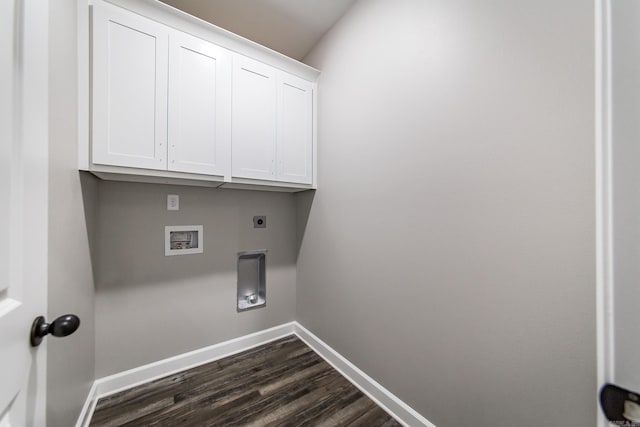 washroom featuring washer hookup, electric dryer hookup, dark hardwood / wood-style flooring, and cabinets