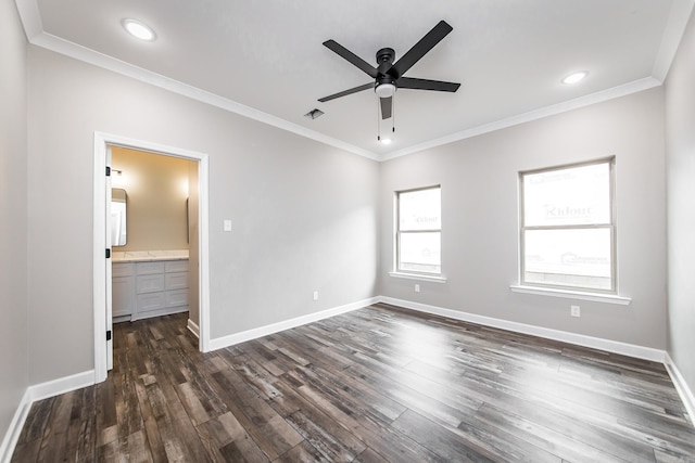 unfurnished bedroom featuring connected bathroom, ceiling fan, dark wood-type flooring, and ornamental molding