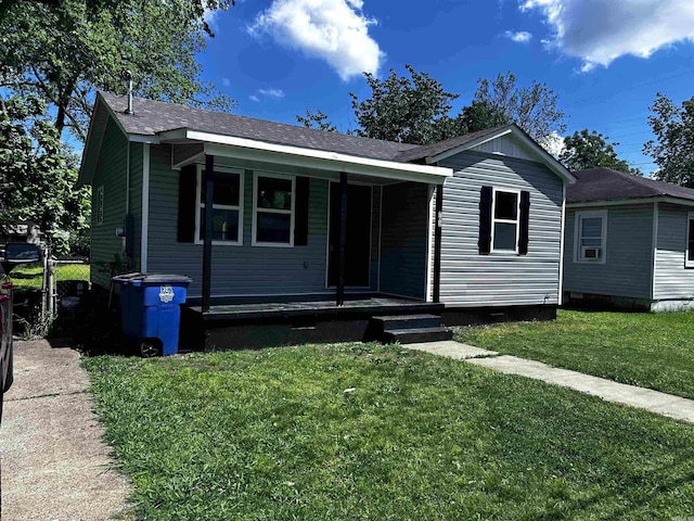 view of front of home featuring a porch and a front yard