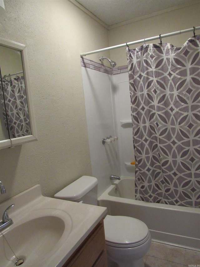 full bathroom featuring tile patterned flooring, vanity, toilet, and shower / bathtub combination with curtain