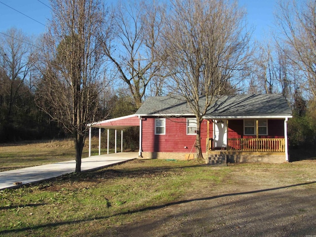 view of front facade with a carport and a porch