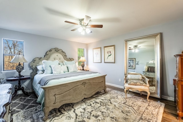 bedroom with hardwood / wood-style floors and ceiling fan