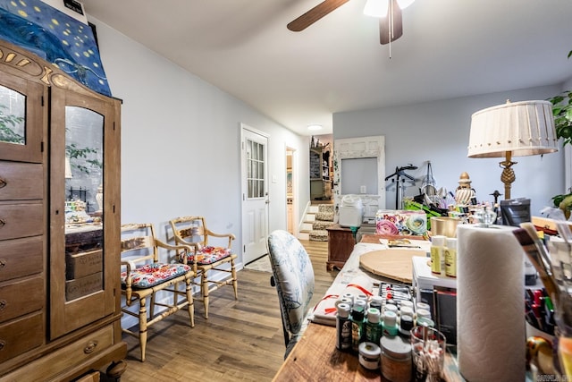 dining space featuring hardwood / wood-style flooring and ceiling fan