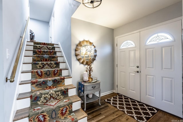 entrance foyer featuring dark wood-type flooring