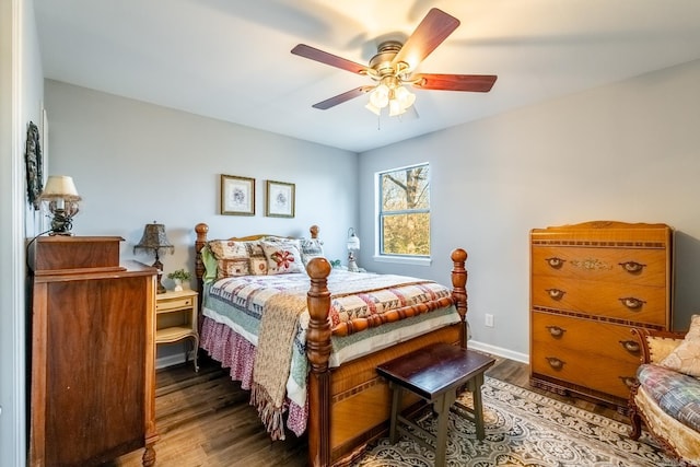 bedroom featuring ceiling fan and hardwood / wood-style flooring