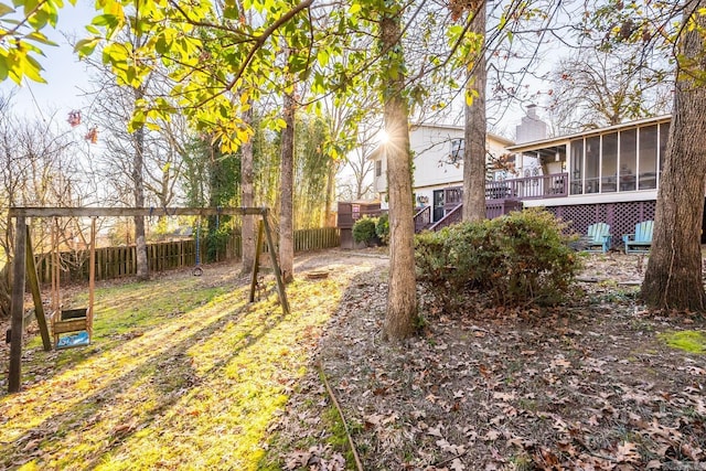 view of yard featuring a sunroom