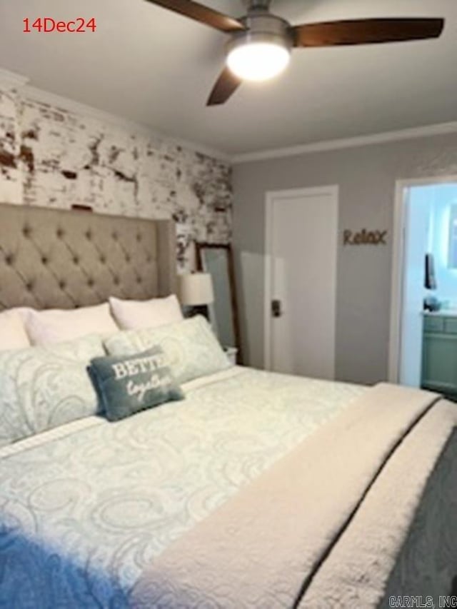 bedroom with ceiling fan, ornamental molding, and ensuite bath