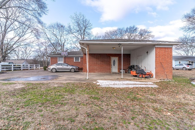 rear view of house with a carport