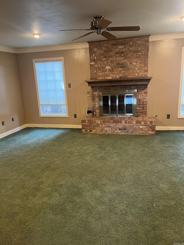 unfurnished living room with carpet flooring, a fireplace, and crown molding