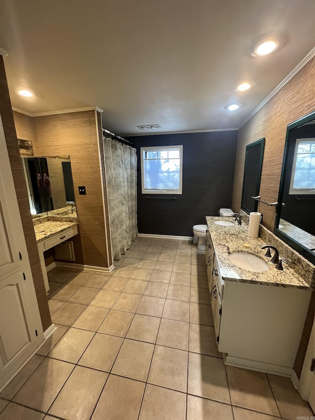 bathroom featuring crown molding, tile patterned flooring, vanity, and toilet