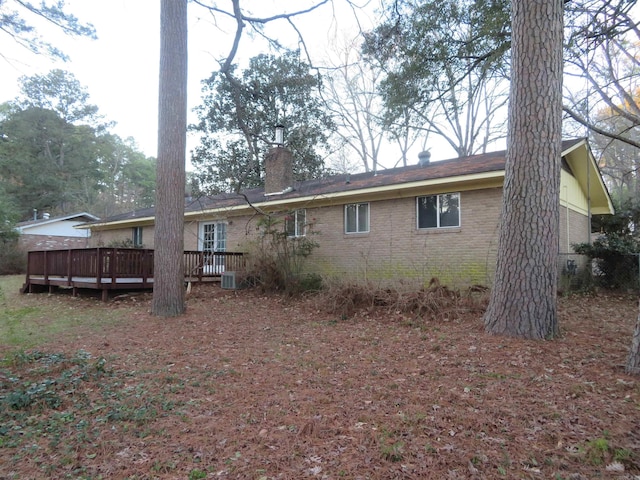 rear view of property with a deck