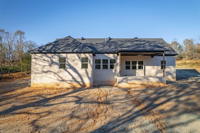 back of house featuring a patio area and ceiling fan